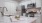 a kitchen with white cabinets