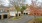 a neighborhood street with houses and trees
