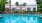 a pool in front of a house
