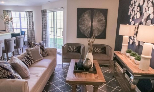 a living room with a couch and a coffee table