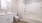 a bathroom with a toilet and bathtub