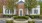 a brick building with a fence and trees in front of it