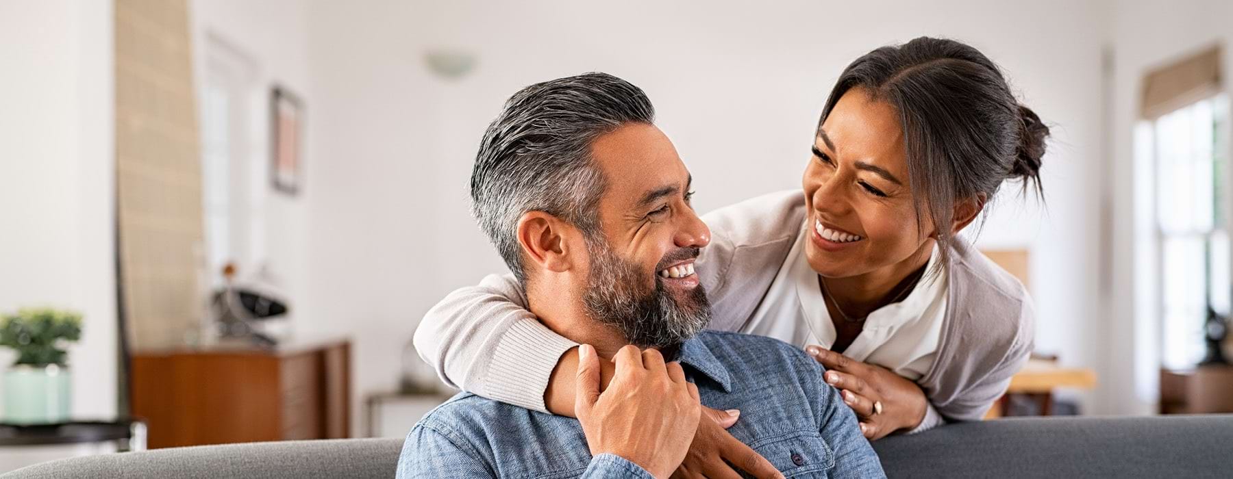 a man and a woman sitting on a couch