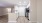 a kitchen with white cabinets