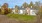 a large house with a lawn in front of it
