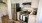 a kitchen with white cabinets